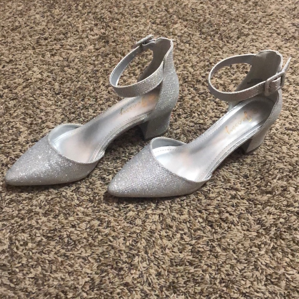 Silver glittery heels in a size 9